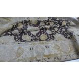 A hard knotted vintage Agra carpet the brown fields with gold bold flower head decoration