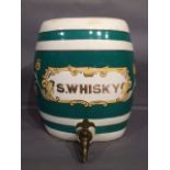 An early C20th pottery whisky barrel