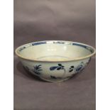 An 18th cent English delft bowl with typical floral decoration