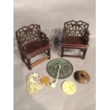 A pair of chinese miniature hardwood armchairs with two jade style discs and a medallion
