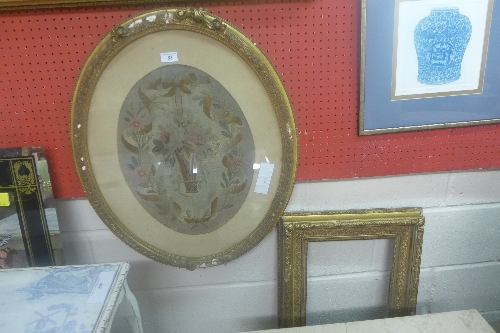 An oriel needlework floral study and a 19th century giltwood frame