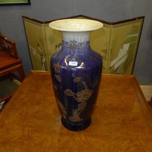 A large Japanese lamp the mauve glaze with pruned tree decoration