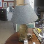 A white glazed table lamp and other with musical detail