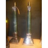 Pair of silver plated and green mantle Corinthian columns table lamps,