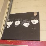 A large print on canvas of the Beatles.