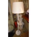 A white painted faux Bamboo standard lamp