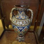 An Islamic influenced pierced earthenware vase