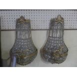 A pair of gilt metal and cut glass wall
