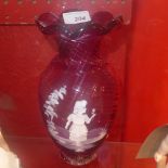 A Mary Gregory style coloured glass vase