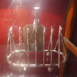 A silver plated toast rack of cricketing