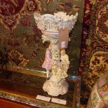 A Meissen style porcelain comport on sta