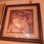 A framed Classical art lithographic prin
