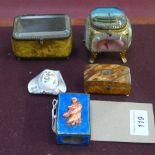 A collection of trinket boxes including an enamel hat form pill box