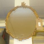 A small circular mirror with ornate gift frame. Length : 42cm, at best