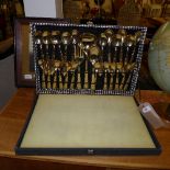 A gold plated cased cutlery set