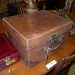 A leather top hat travelling case
