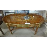 A serpentine crossbanded empire style low table with brass mounts H50 x W10 x D58