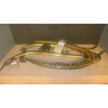 A set of brass horse shackles