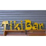 A 1950s wrought iron 'Tiki Bar' sign