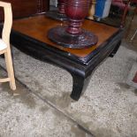 An ebonised black lacquered Chinese style low table h 40, w 107