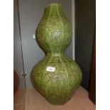 A green glazed double gourd vase with leaf decoration H 52 cm