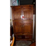 A Chinese type faux bamboo cabinet with panel doors and open shelf H185 x W86 x D45