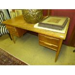 A George II writing desk and a similar open armchair