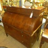 A good empire mahogany and brass cylinder bureau with superstructure above fitted interior and lined
