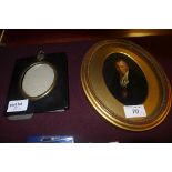 A Victorian oval miniature portrait of a clergy man framed and glazed 14cm x 9cm and an ebonised