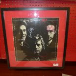A framed LP sleeve for the King Crimson album 'Red' signed by the band
