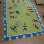 A machine made Designers Guild woollen childrens rug, the green ground with grenadier guard motifs,