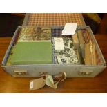 A vintage case with various travel stickers,