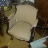 A mahogany American style tub chair upholstered in grey fabric on ball and chain feet