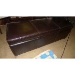 A contemporary brown leather Ottoman (40 x 120 x 45)