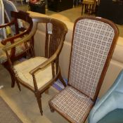 An Edwardian in laid mahogany tab chair with pierced back above pad seat on turned tapering supports