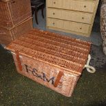 A large Fortnum and Mason wicker hamper.