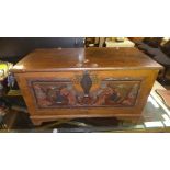 A C20th carved teak trunk of rectangular form- H35, W60,