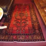 A fine North West Persian Kurdie carpet 250 x 155cm with repeating animal and floral motifs on a