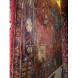 A fine North West Persian Bidjar rug 230cm x 150cm double pendant medallion on a terracotta field