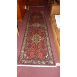 A fine North West Persian Malayer runner 272cm x 80cm triple diamond ivory floral medallion on a