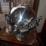 A chromed model deep sea diver's helmet