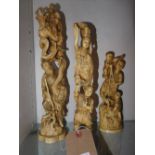 Three Japanese carved bone figural groups, each ornately carved, one of a fisherman, and another