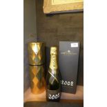 Two vintage 2002 bottles of Moet and Chandon