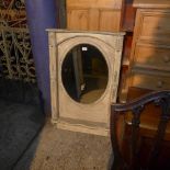 A Victorian style distressed mirror with oval bevelled plate (H 104 x W 12)