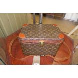 A Louis Vuitton vanity case with fitted interior (a/f)