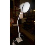 An 1960s white painted adjustable desk lamp