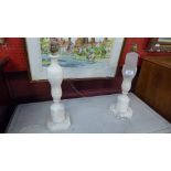 A pair of white onyx table lamps