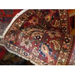An extremely fine North West Persian Baktiar carpet 305cm x 218 cm central floral pendent medallion