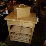 A 20th Century pine butchers block and similar bread bin