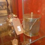 A silver plated half gadrooned tea pot together with a silver plated biscuit barrel